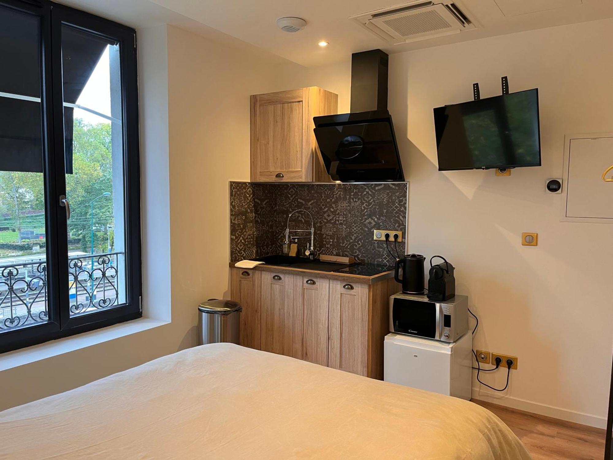 Hdg Hotel Gare De L'Isle Adam Appart'S Hotel Parmain Экстерьер фото